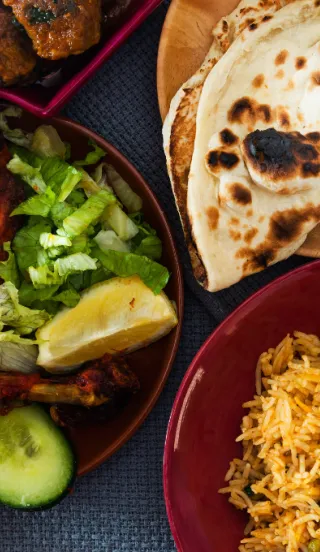 A selection of Indian dishes served on table